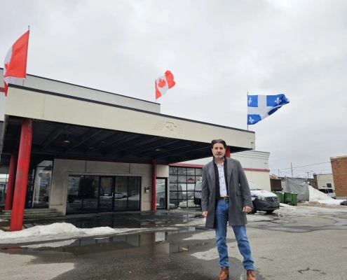 Renovco president Walter Assi outside company offices.